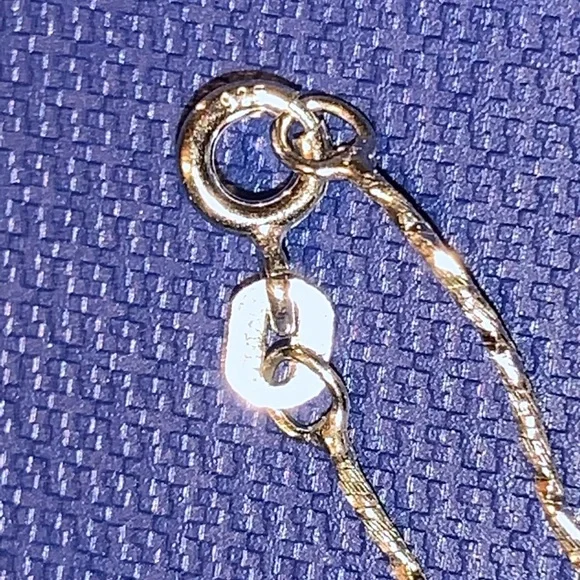 New 1/10 carat paved diamond necklace in sterling silver